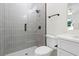 Modern bathroom with gray tile shower and white vanity at 4190 Rossmore Dr, Orlando, FL 32810
