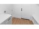 Bright laundry room with built-in cabinetry and quartz countertops at 4190 Rossmore Dr, Orlando, FL 32810