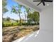 Enjoy lake views from this covered patio at 4190 Rossmore Dr, Orlando, FL 32810