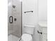 Modern bathroom with a glass shower and white toilet at 4190 Rossmore Dr, Orlando, FL 32810