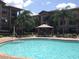 Community pool with a relaxing atmosphere at 914 Charo Pkwy # 114, Davenport, FL 33897