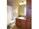 Clean bathroom with a single vanity and shower/tub combo at 914 Charo Pkwy # 114, Davenport, FL 33897