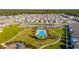 Aerial view of community pool with surrounding lounge area and landscaping at 5241 Sanders Oak Trl, Saint Cloud, FL 34771