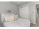 Charming bedroom with floral bedding and built-in closet at 5241 Sanders Oak Trl, Saint Cloud, FL 34771