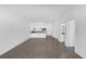Bright and spacious living room with tile floors and sliding glass doors leading to backyard at 450 Lake Shore Pkwy, Davenport, FL 33896
