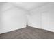 Spacious bedroom with carpet flooring and access to hallway at 450 Lake Shore Pkwy, Davenport, FL 33896