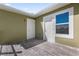 Nice patio with access to the interior of the home at 450 Lake Shore Pkwy, Davenport, FL 33896