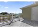 Private deck overlooking a tranquil lake and neighborhood at 450 Lake Shore Pkwy, Davenport, FL 33896