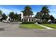 Community clubhouse with fountain and lush landscaping at 9033 Rhodes St, Kissimmee, FL 34747