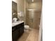 Bathroom with shower and single vanity at 9033 Rhodes St, Kissimmee, FL 34747
