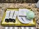 Gold tray with artisan soap, bath bombs, and toiletries at 1465 Belle Terre Rd, Davenport, FL 33896