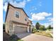 Two story house with a large magnolia tree in front at 1465 Belle Terre Rd, Davenport, FL 33896