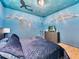 Under the sea bedroom with mural at 1465 Belle Terre Rd, Davenport, FL 33896