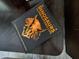 Book about dinosaurs on a dark wooden surface at 1465 Belle Terre Rd, Davenport, FL 33896
