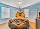 Bedroom with unique dinosaur pterodactyl bed at 1465 Belle Terre Rd, Davenport, FL 33896