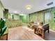 Jungle-themed common area with wooden furniture at 1465 Belle Terre Rd, Davenport, FL 33896