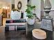 Stylish coffee table display with decorative objects and books at 1465 Belle Terre Rd, Davenport, FL 33896
