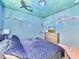 Under the sea themed bedroom with mural at 1465 Belle Terre Rd, Davenport, FL 33896