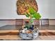 Table centerpiece with dinosaur skull and greenery at 1465 Belle Terre Rd, Davenport, FL 33896