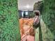 Fun playroom with dinosaur theme, mural, and fossil accents at 1465 Belle Terre Rd, Davenport, FL 33896