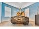 Dinosaur themed bedroom with unique log bed at 1465 Belle Terre Rd, Davenport, FL 33896