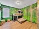 Jungle-themed bedroom with bunk beds and mural at 1465 Belle Terre Rd, Davenport, FL 33896