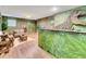 Jungle-themed common area with wooden furniture at 1465 Belle Terre Rd, Davenport, FL 33896