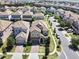 Aerial view of house and neighborhood showing community at 1465 Belle Terre Rd, Davenport, FL 33896