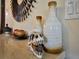 Entryway decor with dinosaur skull and vases at 1465 Belle Terre Rd, Davenport, FL 33896