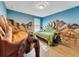Dinosaur-themed bedroom with twin beds at 1465 Belle Terre Rd, Davenport, FL 33896