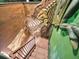 Detailed view of stairs with dinosaur fossil wall art at 1465 Belle Terre Rd, Davenport, FL 33896