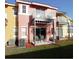 Private patio with red mulch and two chairs at 904 Park Terrace Cir, Kissimmee, FL 34746