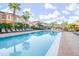 Inviting community pool with lounge chairs at 904 Park Terrace Cir, Kissimmee, FL 34746