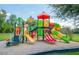 Colorful playground with slides and climbing structures at 904 Park Terrace Cir, Kissimmee, FL 34746