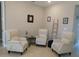 Cozy sitting area with comfy armchairs and side table at 5430 Nw 34Th St, Ocala, FL 34482