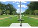 Scenic community park with walking paths and flagpole at 5430 Nw 34Th St, Ocala, FL 34482