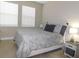 Bright bedroom featuring a comfortable bed and plenty of natural light at 5430 Nw 34Th St, Ocala, FL 34482