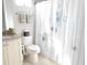 Clean bathroom with shower/tub combo and granite vanity at 5430 Nw 34Th St, Ocala, FL 34482