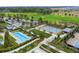 Aerial view of community pool, tennis courts, and green spaces at 5430 Nw 34Th St, Ocala, FL 34482