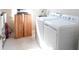 Laundry room with washer, dryer, and extra storage at 5430 Nw 34Th St, Ocala, FL 34482