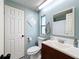 Clean bathroom with updated vanity and shower/tub combo at 202 Ellsworth Ct, Kissimmee, FL 34758