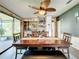 Bright dining room with a wood table and built-in bar at 202 Ellsworth Ct, Kissimmee, FL 34758