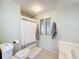 Bathroom with shower/tub combo and stained glass window at 202 Ellsworth Ct, Kissimmee, FL 34758
