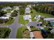 Wide aerial view of a mobile home community showing a home's location and neighborhood at 202 Ellsworth Ct, Kissimmee, FL 34758