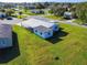 Aerial view of a mobile home community, showcasing the property's location and surrounding area at 202 Ellsworth Ct, Kissimmee, FL 34758
