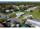 An aerial shot of a mobile home community with a focus on a particular property at 202 Ellsworth Ct, Kissimmee, FL 34758
