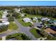 An aerial view of a mobile home community highlighting a home's setting and neighborhood at 202 Ellsworth Ct, Kissimmee, FL 34758