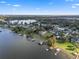 Aerial view of house and lakefront property at 6019 Linneal Beach Dr, Apopka, FL 32703