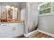 Simple bathroom with shower/tub combo and granite vanity at 6019 Linneal Beach Dr, Apopka, FL 32703
