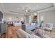 Main bedroom with sitting area, fireplace, and water views at 6019 Linneal Beach Dr, Apopka, FL 32703
